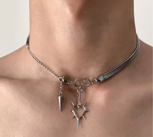 Necklace with unique pendant worn by a person on a neutral background