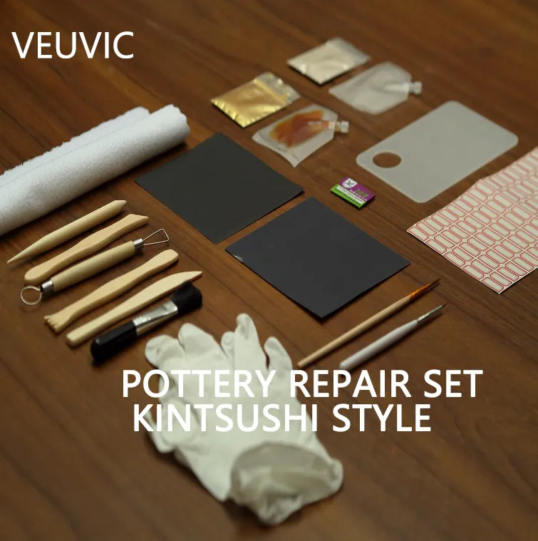 Pottery repair set with tools and materials on a wooden surface, featuring the brand 'VEUVIC'.
