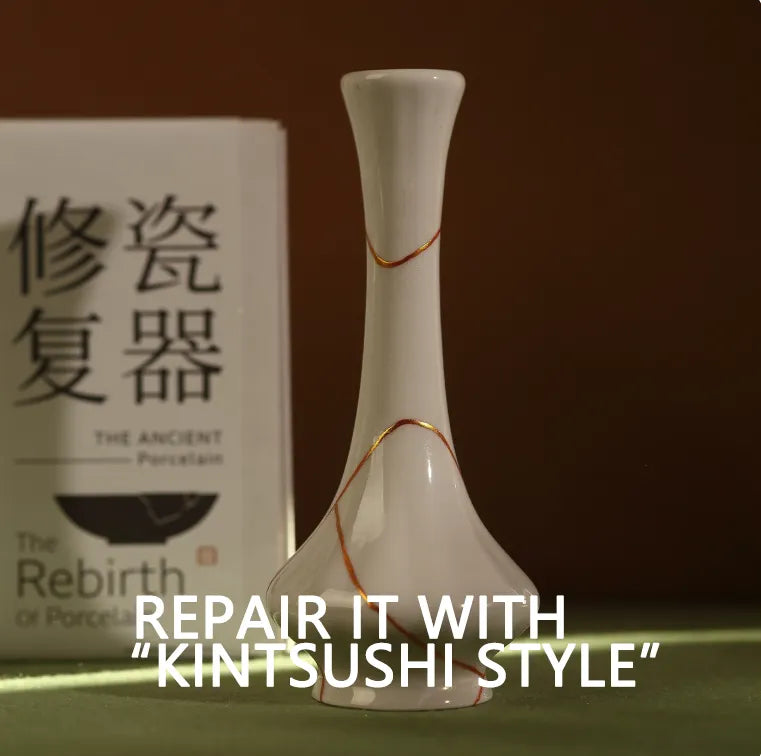 White ceramic vase with a repair line, box in the background, text 'Repair it with Kintsushi Style'.